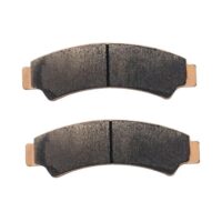 Quad Spares Segway Snarler ATV6 front brake pads showing dark friction compound face and gold metal backing plates