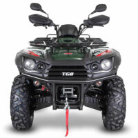 Front view of a green TGB Blade 600SL ATV from Quad Spares, showcasing the aggressive grille, dual headlights, and front bumper.