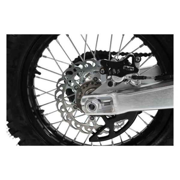 10ten jhl lx300 dirt bike rear wheel sprocket tyre quad spares Rear wheel view of the 10TEN JHL LX300 dirt bike at Quad Spares showing the 18 inch alloy rim heavy duty drive chain sprocket wave disc brake caliper and aggressive rear knobby tyre tread profile