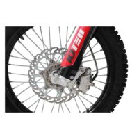 10ten jhl lx300 dirt bike front wheel tyre quad spares Front wheel view of the 10TEN JHL LX300 dirt bike at Quad Spares showing the 21 inch alloy rim heavy duty hydraulic wave disc brake assembly stainless steel spokes and aggressive front knobby tyre tread profile